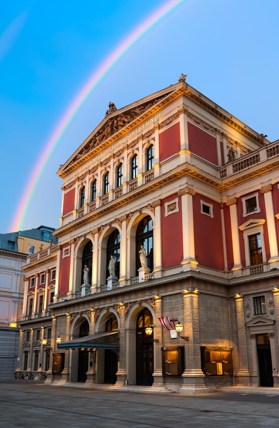 The Wiener Musikverein beneath a rainbow at dusk, Vienna